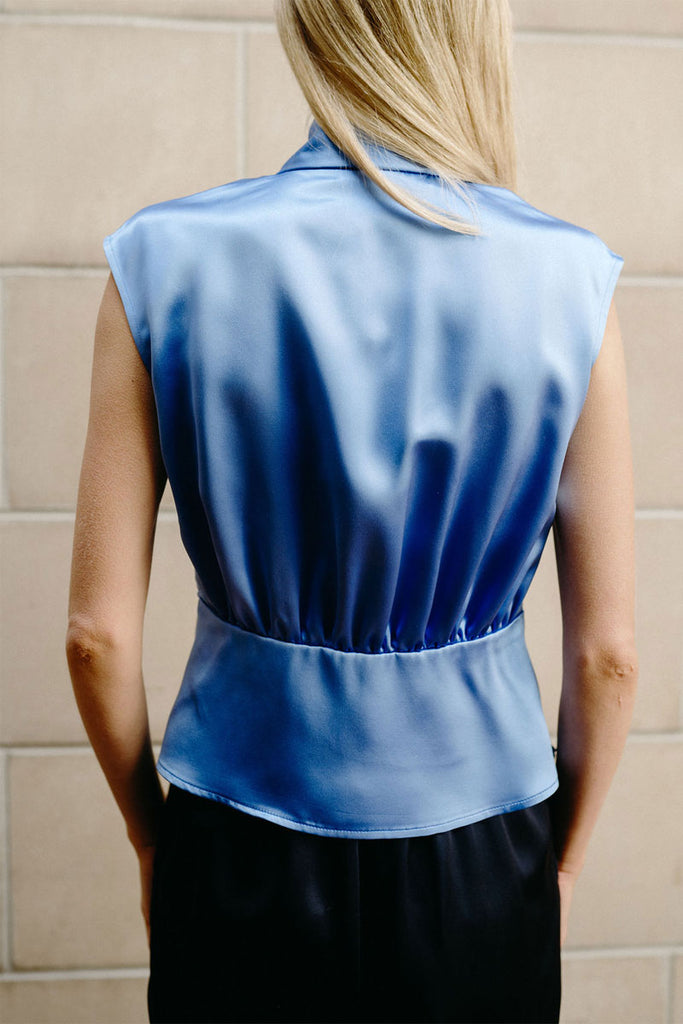 Back view of Lucie showing pleated waistline