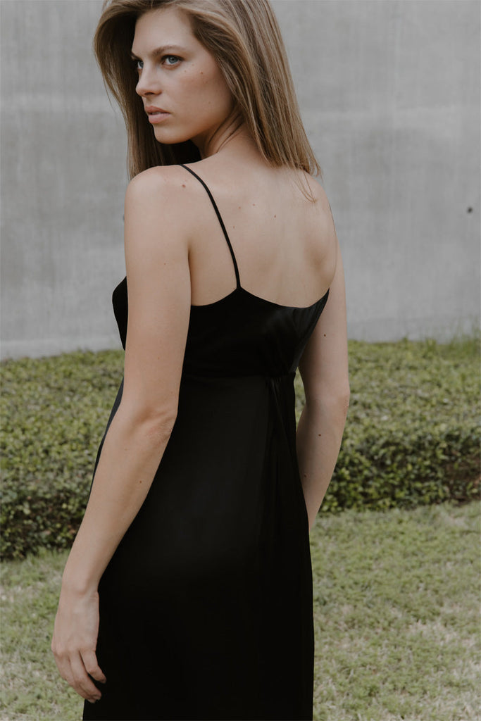 Back view of Sienna in black silk charmeuse