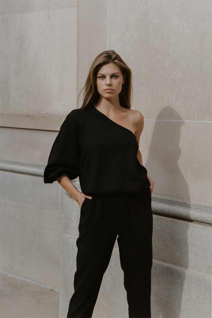Olivia, off-shoulder jumpsuit in black wool crepe