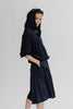 Neneh hoodie styled with Kouka midi skirt, both in Navy silk