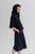 Neneh hoodie styled with Kouka midi skirt, both in Navy silk