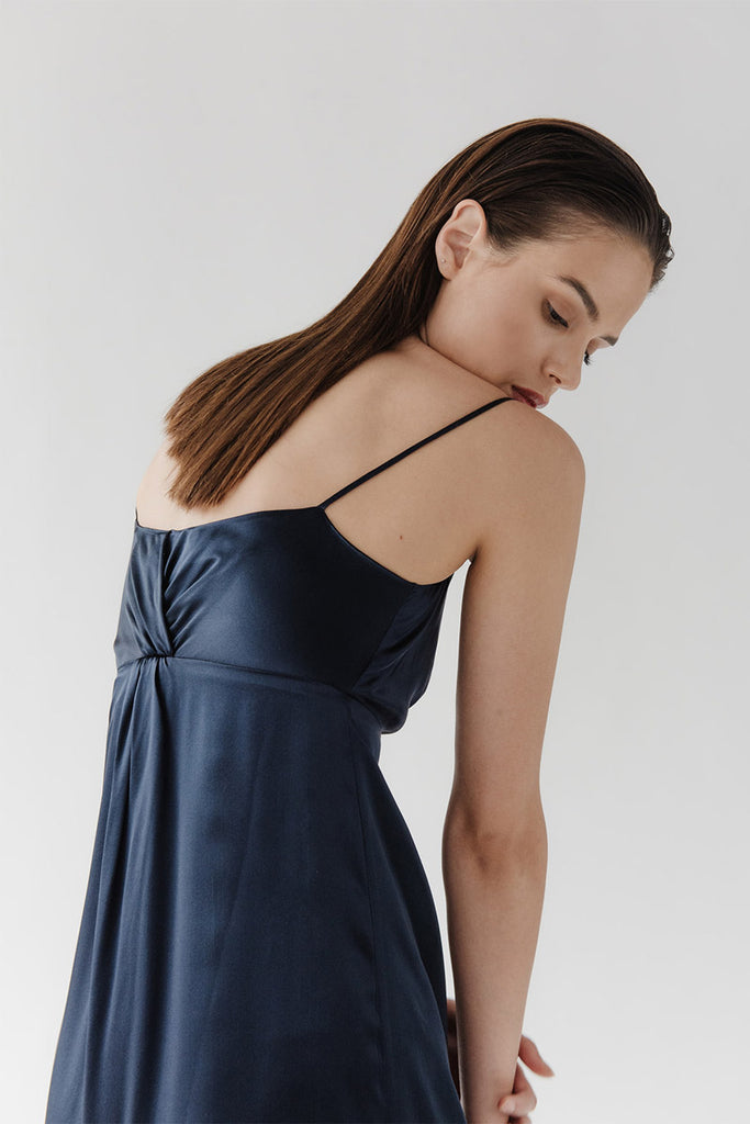 Back detail of Sienna showing twisted pleat on the empire waistline